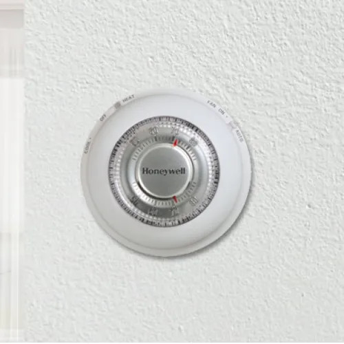 Resideo Round Manual Non-Programmable Thermostat with Fahrenheit Plate, Heat Only, Premier White - T87K1007