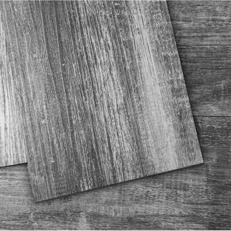Art3d Grayish Black 1.27mm x 36 in. L x 6 in. Water Resistant Wood Look Peel and Stick Vinyl Flooring Tiles54 sq. ft./case